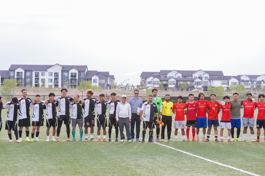 GBCC soccer tournament teams lined up on the field